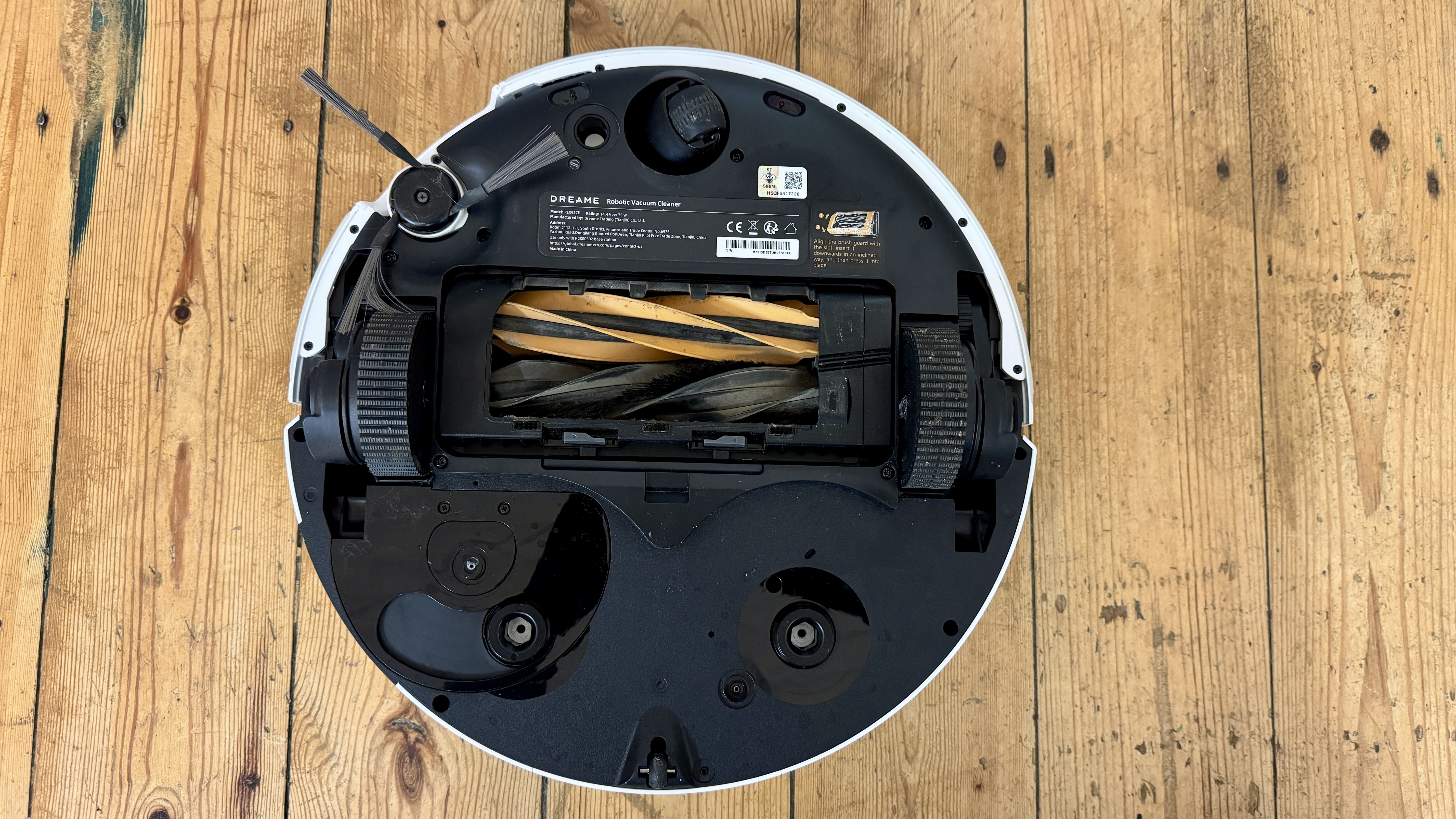 Dreame Matrix10 Ultra robot vacuum flipped over to show underside