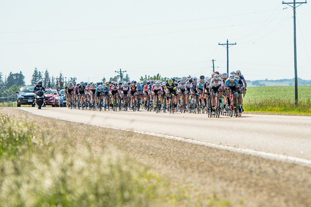 After the early crash the men's race resumes as different riders try to get away