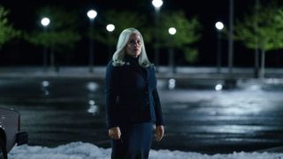 Harmony Cobel standing in a snowy parking lot at night in Severance season 2