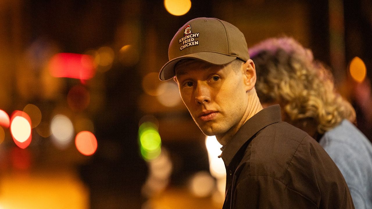 Josh Finan as Marco in The Responder, wearing a cap