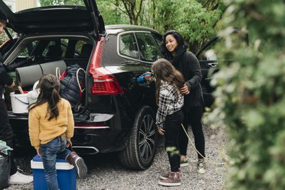 Family getting into the car