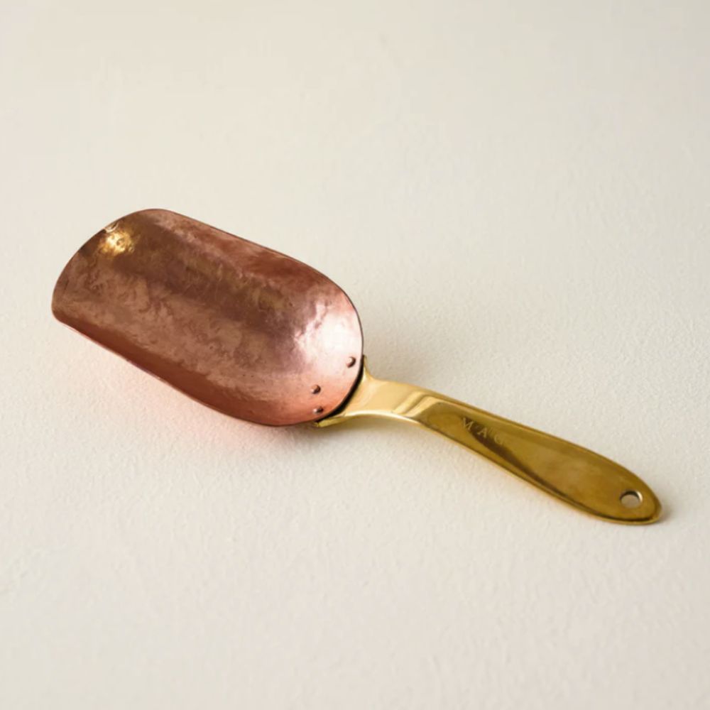Copper scoop with brass handle