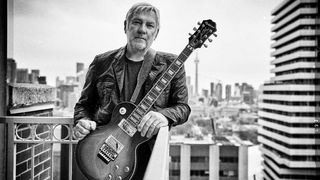 Alex Lifeson with his new Epiphone Les Paul Axcess Standard