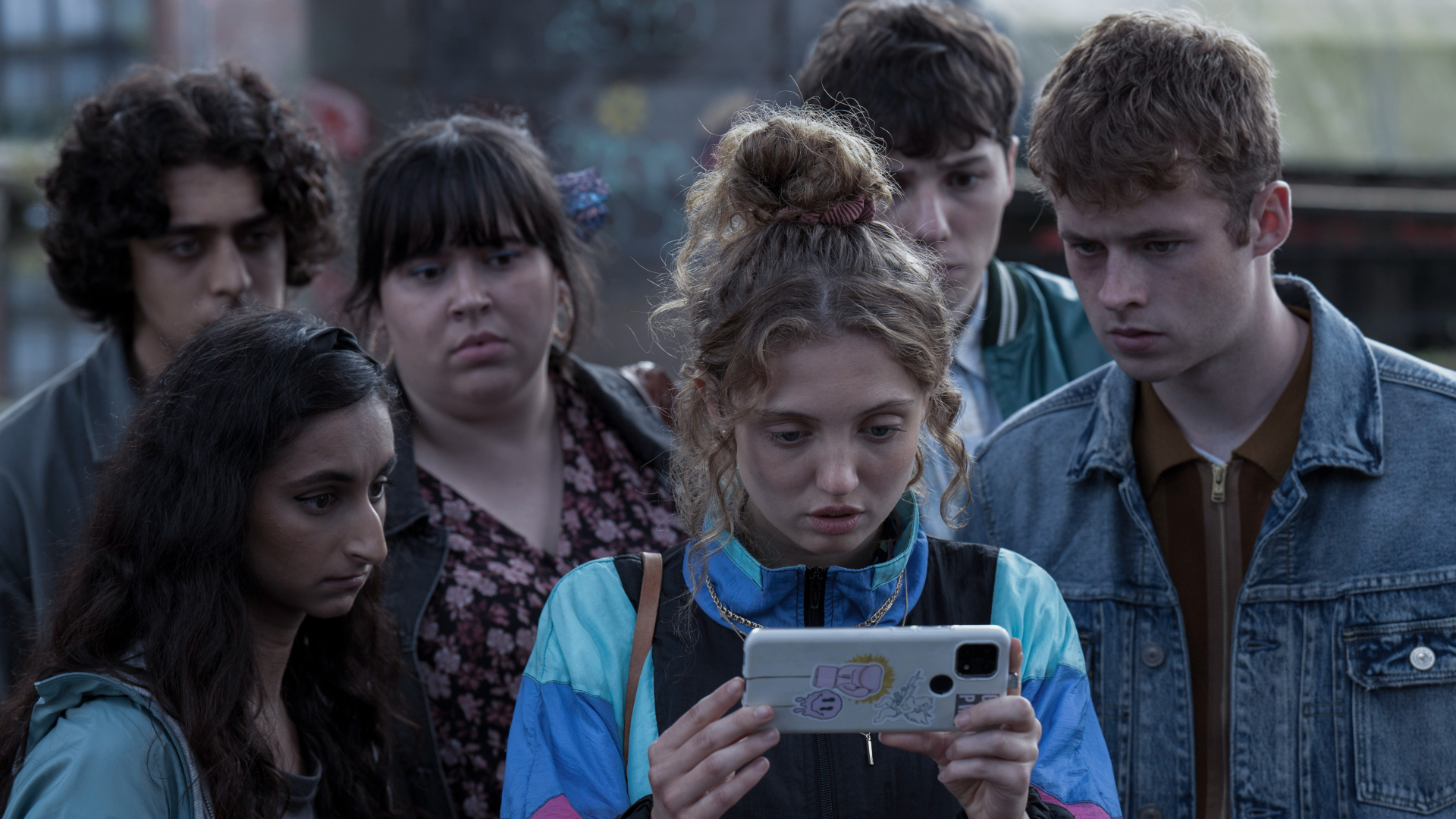TV Tonight Red Rose's main cast gather to look at a phone