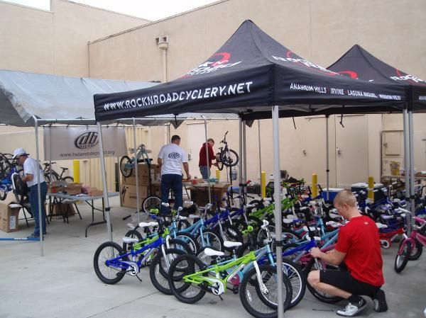 Neben in the process of a bike build with some of the crew.