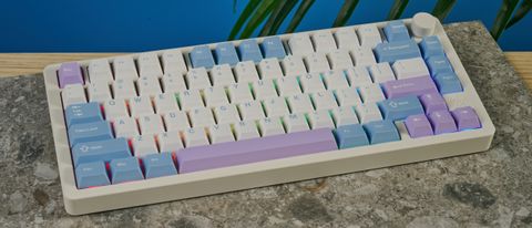 A pink, blue and white Gamakay TK75 Pro wireless mechanical keyboard with hot-swappable linear switches