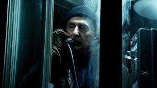 Irving inside a phone booth in Severance Season 2