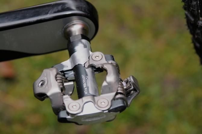 Shimano's M980 pedals appear to have been disassembled and sanded smooth on some surfaces