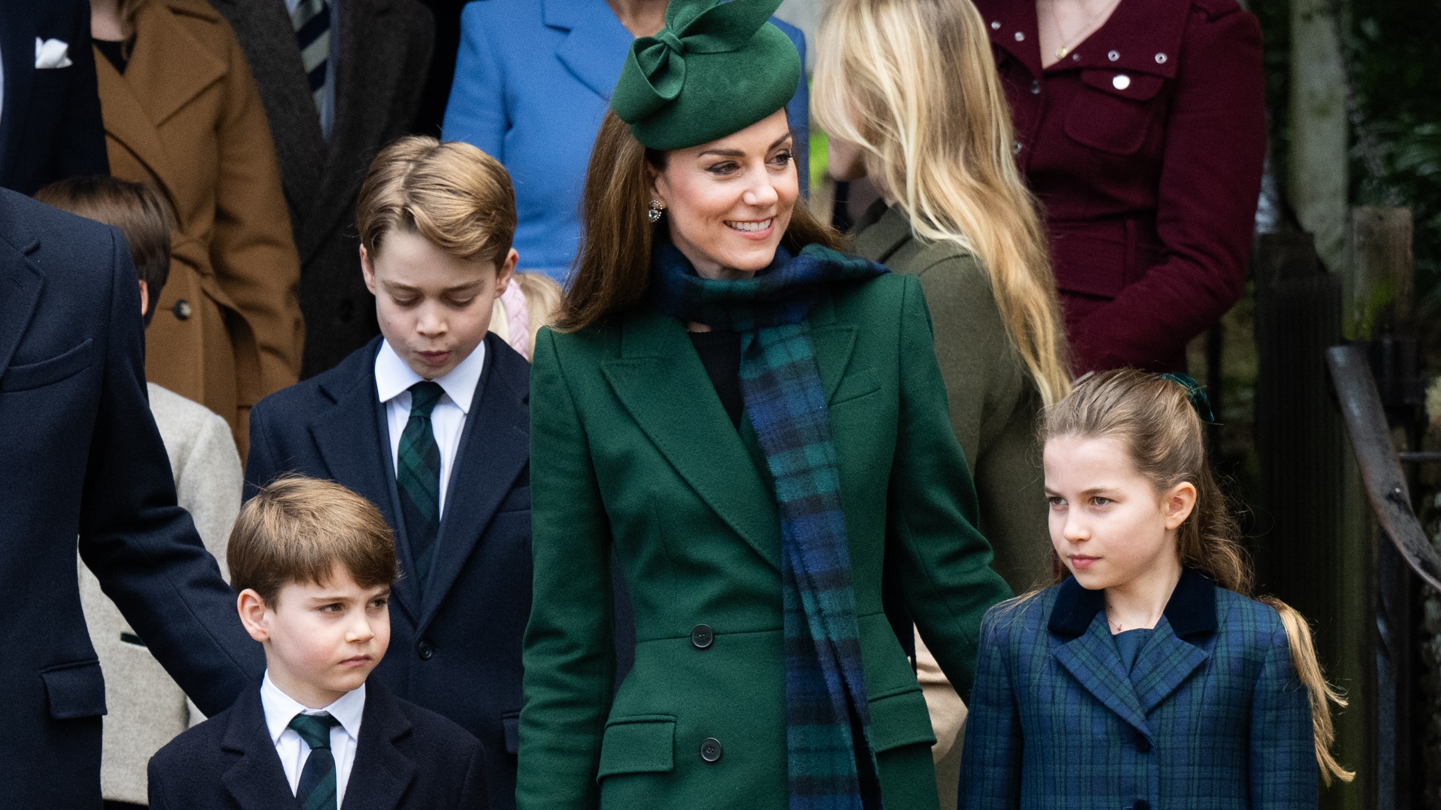Prince Louis, Prince George, Catherine, Princess of Wales and Princess Charlotte leave after the Christmas Morning Service at Sandringham Church on December 25, 2024