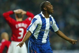 Benni McCarthy celebrates after scoring for Porto against Manchester United in the Champions League in February 2004.