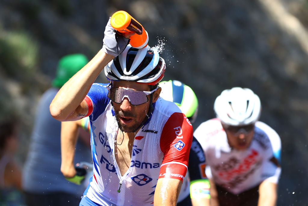 MENDE FRANCE JULY 16 Thibaut Pinot of France and Team Groupama FDJ cools down to refresh itself in the breakaway during the 109th Tour de France 2022 Stage 14 a 1925km stage from SaintEtienne to Mende 1009m TDF2022 WorldTour on July 16 2022 in Mende France Photo by Michael SteeleGetty Images