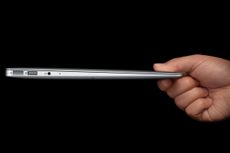 The 13in MacBook Air being held