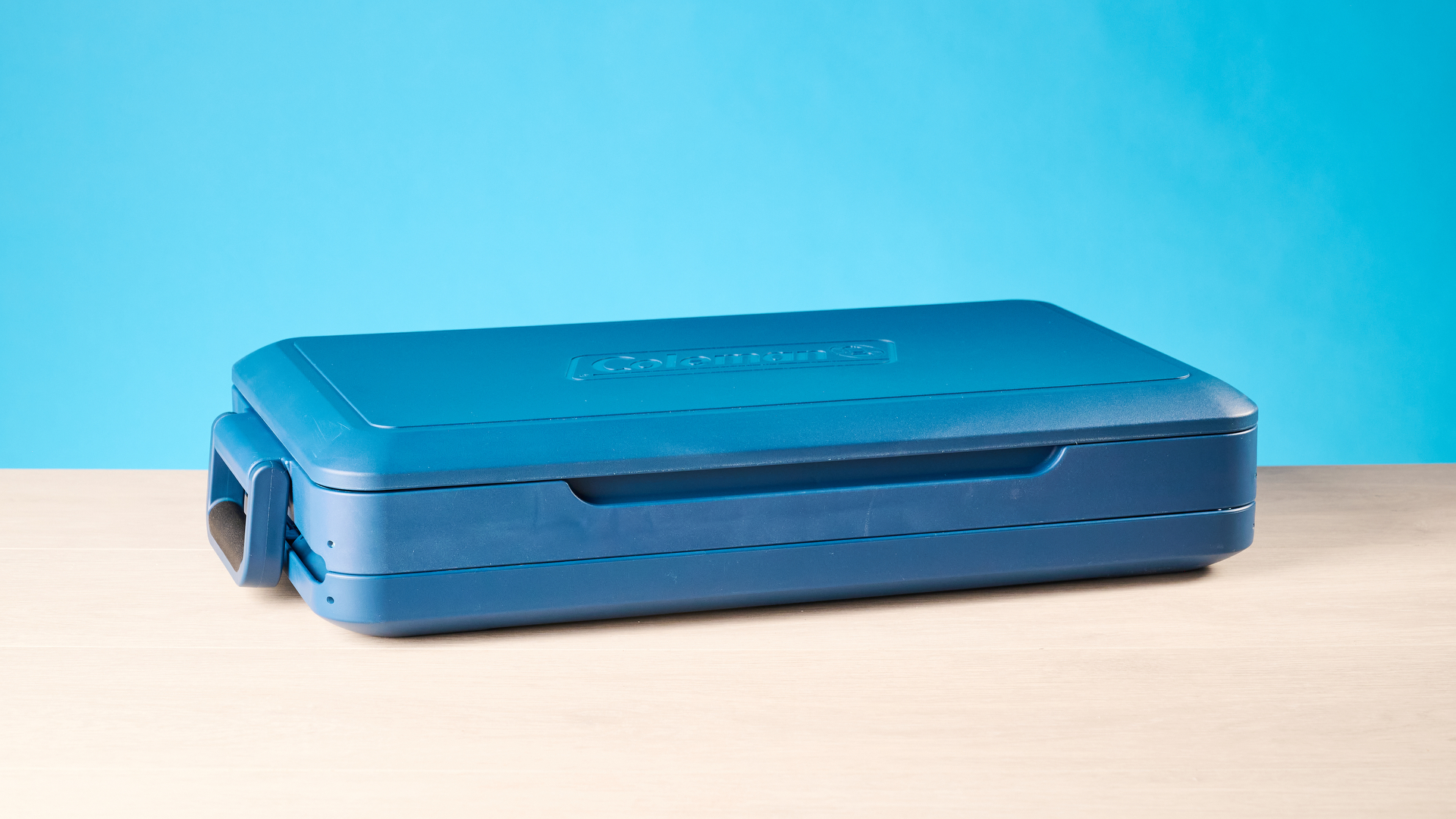 the coleman snap 'n go collapsible cooler photographed with the blue tom's guide background