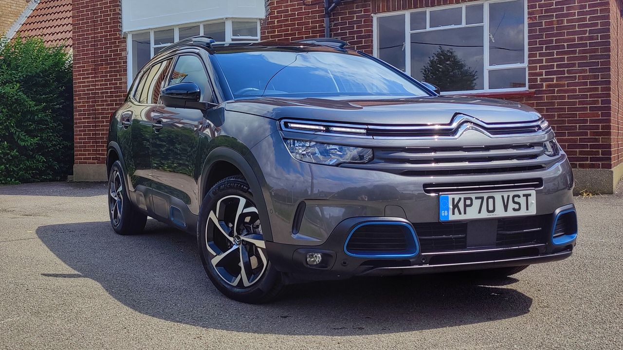 Front view of Citro&euml;n C5 AirCross PHEV parked outside a house