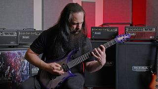 John Petrucci playing guitar