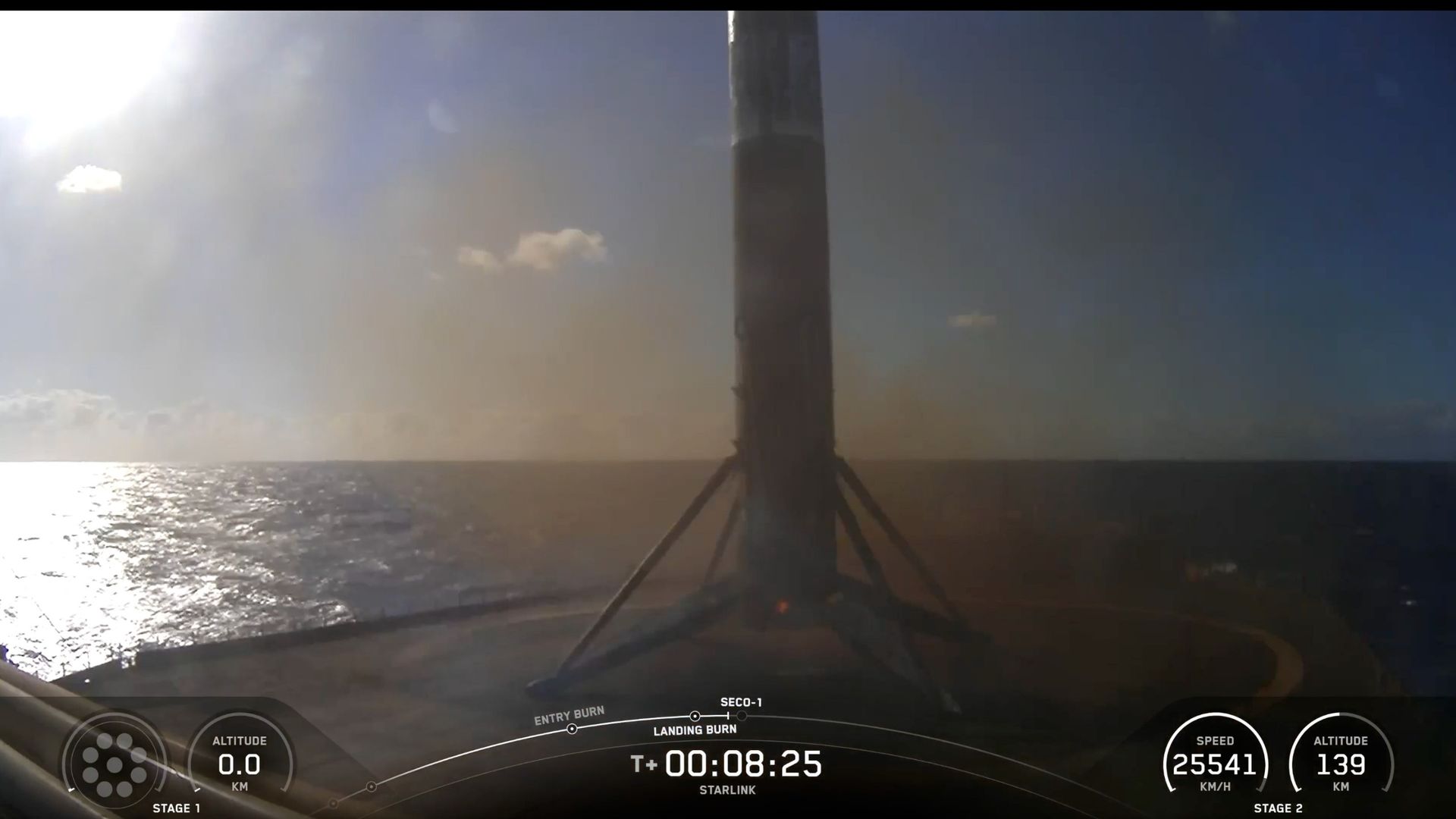 a black and white rocket rest on the deck of a ship at sea