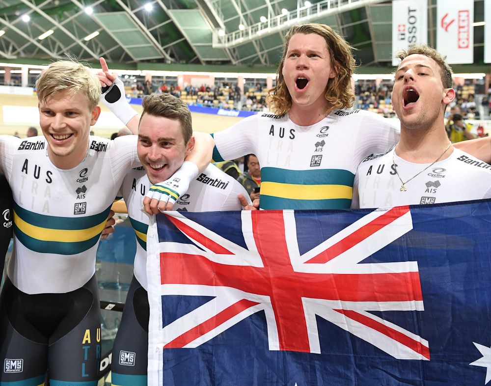 Australia's team celebrates after breaking the team persuit world record during the UCI Track Cycling World Championships