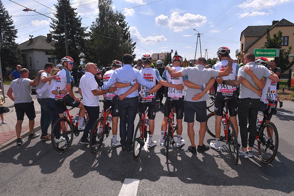 Lotto Soudal riders and staff at the start of stage 4 that was neutralised in memory of Bjorg Lambrecht