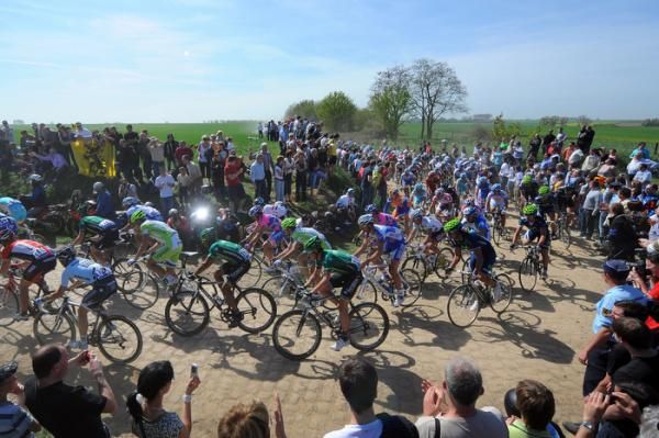 The Paris-Roubaix peloton takes a corner