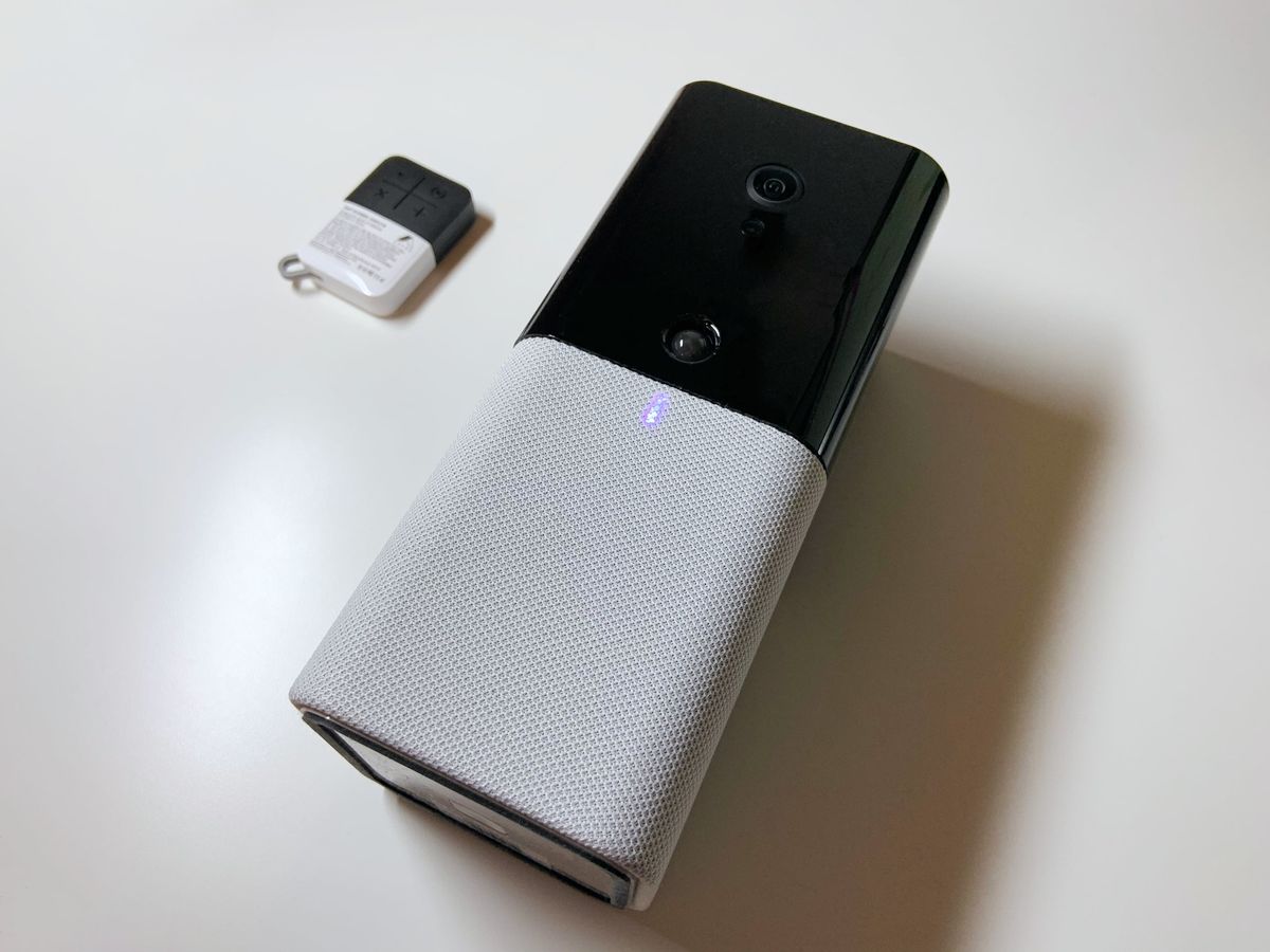 Abode iota Gateway and Keyfob on a desk