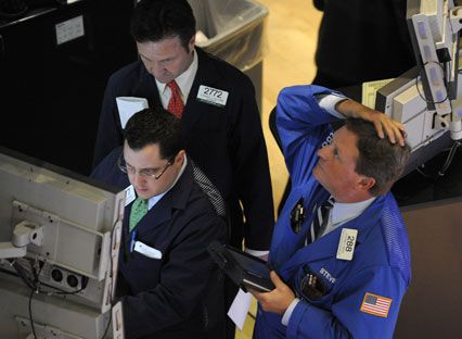 Traders on the floor of the New York Stock Exchange