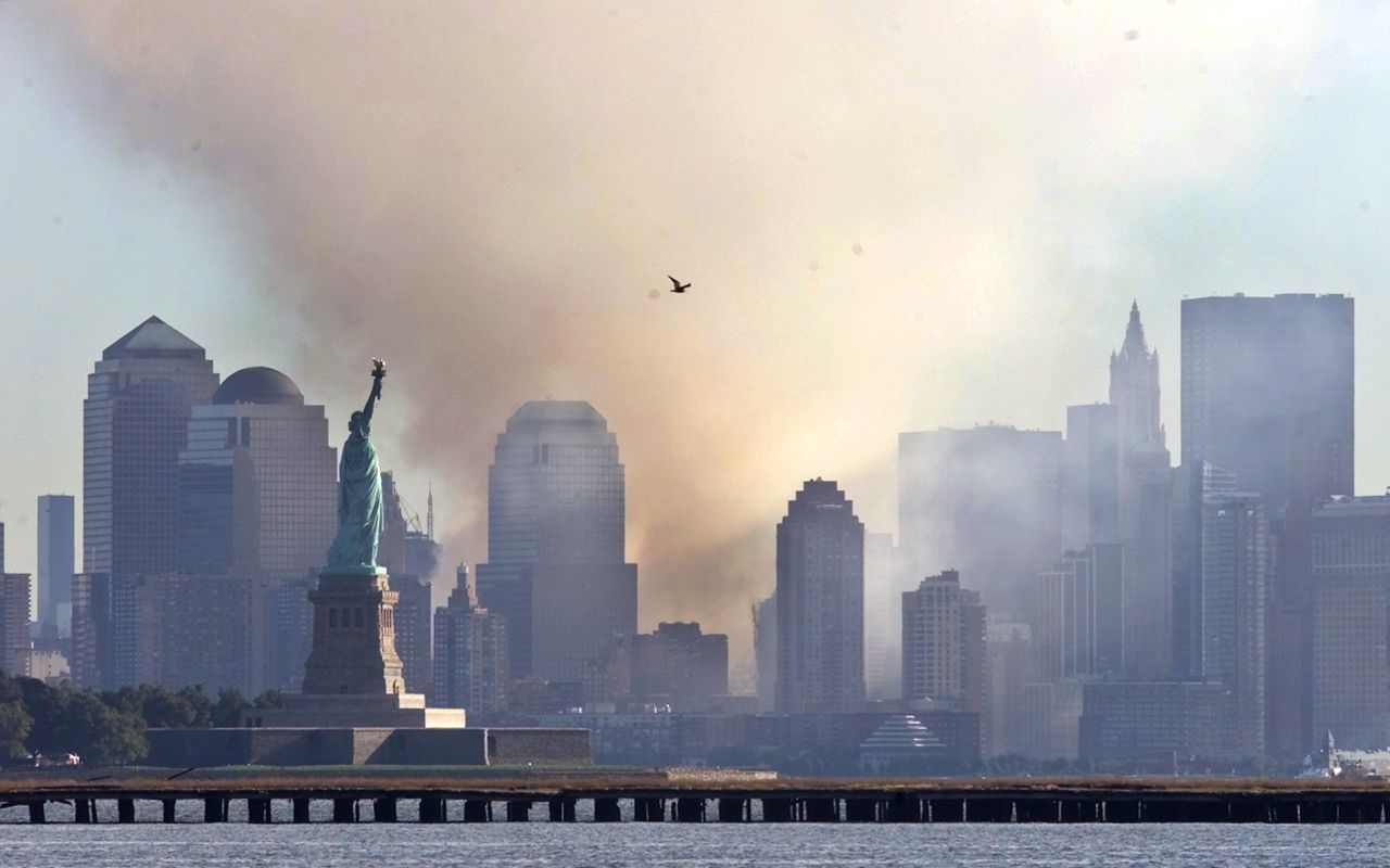 - Smoke from the remains of New York&amp;#039;s World Trade Center shrouds lower Manhattan, September 12, 2001.