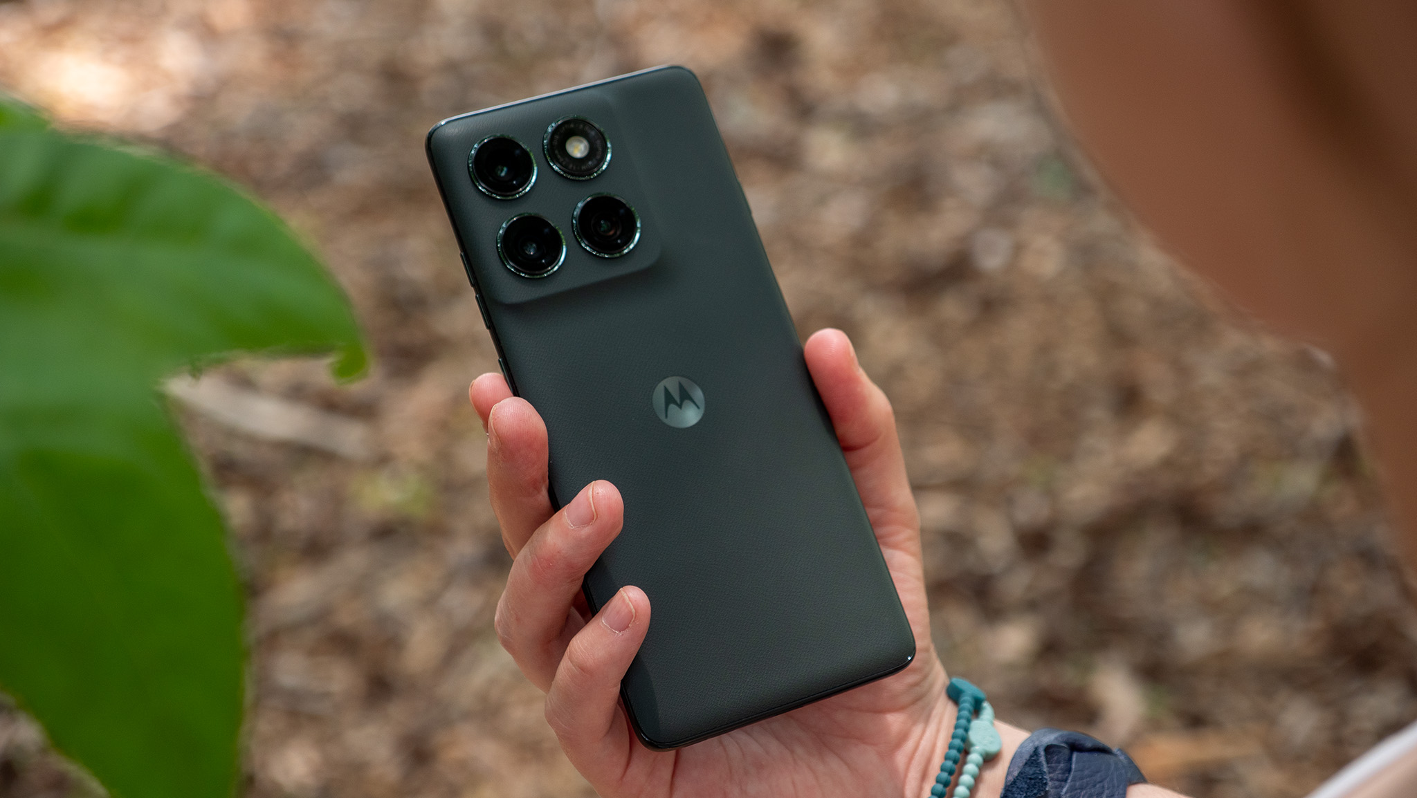 The vegan leather back of the forest green Motorola Edge 2025