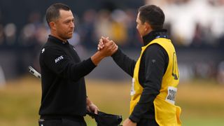 Xander Schauffele offers congratulations to caddie Austin Kaiser at The Open