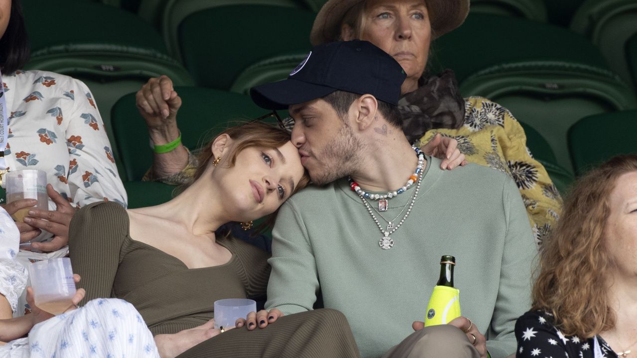 london, england july 03 phoebe dynevor and pete davidson hosted by lanson attend day 6 of the wimbledon tennis championships at the all england lawn tennis and croquet club on july 03, 2021 in london, england photo by karwai tangwireimage