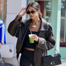 Laura Harrier elevated her casual coffee run style with a Coach Tabby Bag while out in LA. The actress looked chic in a leather jacket and an athleisure set but took it to the next level with her choice of bag.