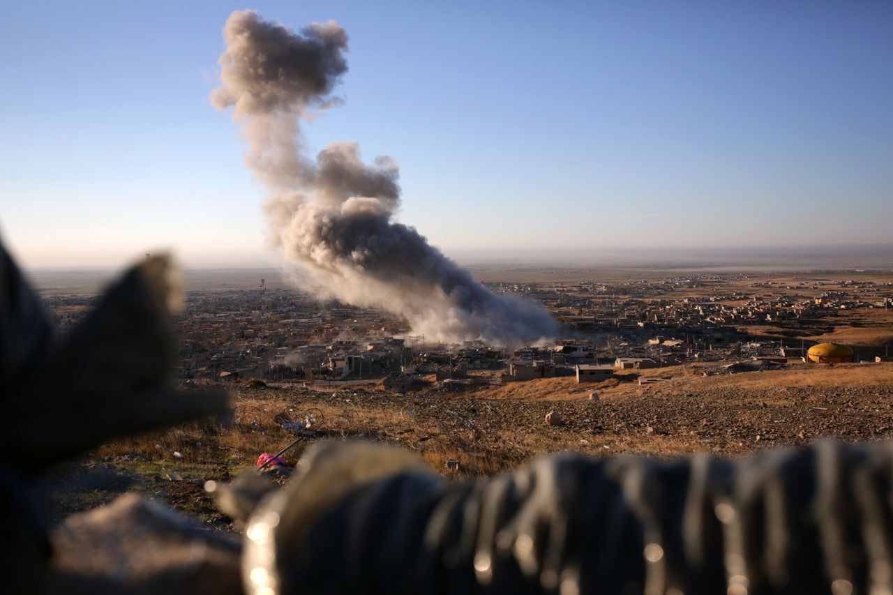 Smoke rises above Sinjar.