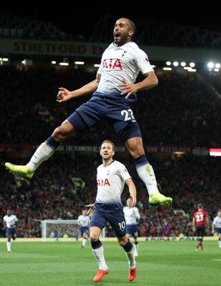 A leaping Lucas Moura celebrates scoring against Manchester United