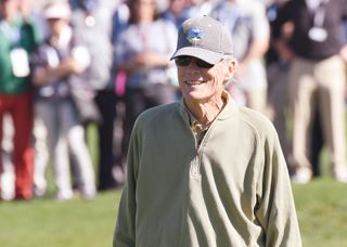 Clint Eastwood walks down the fairway at Pebble Beach