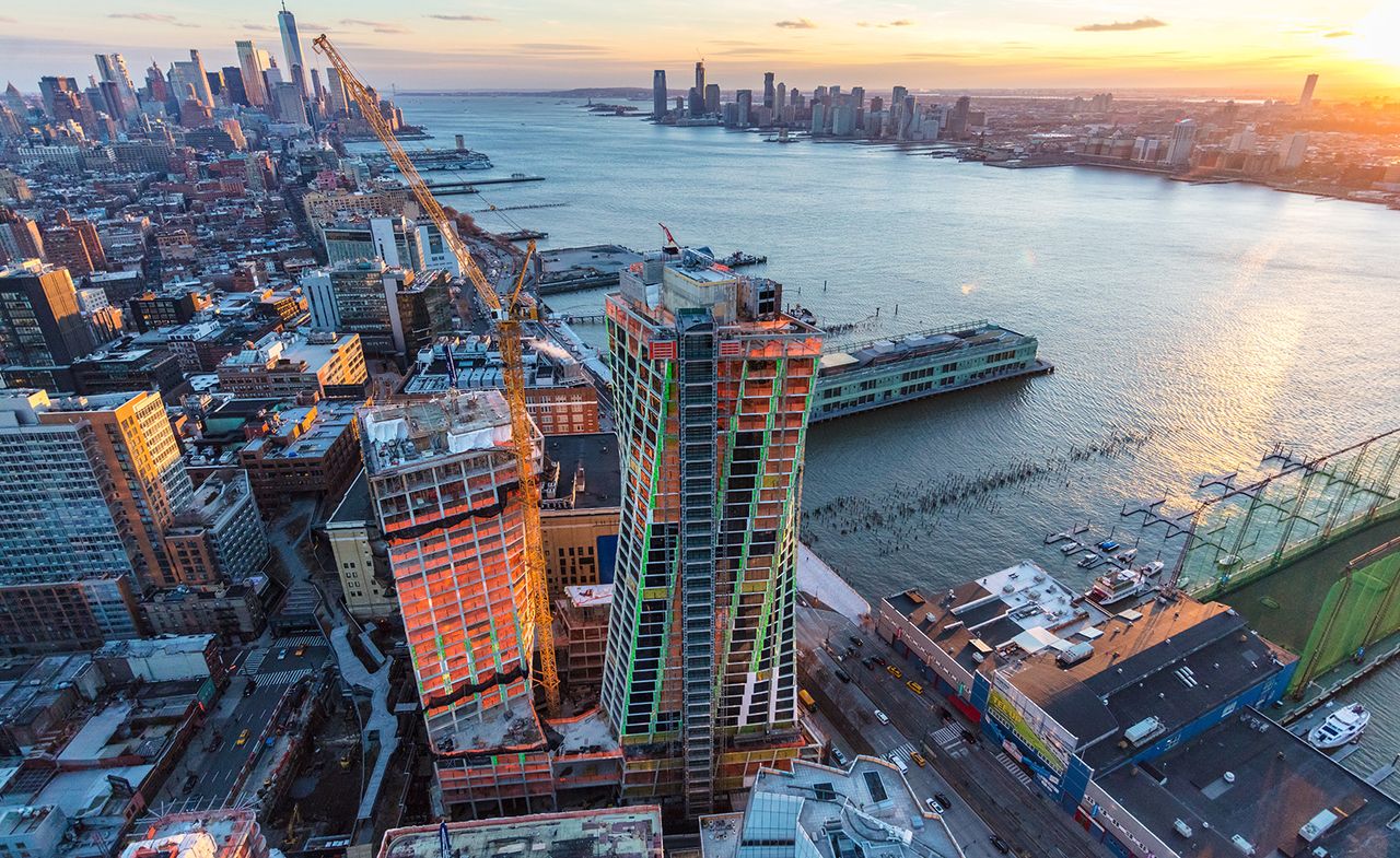 Birdseye view of skyscrapers next to river