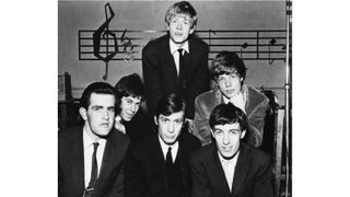 Ian Stewart (far left), who had befriended Beck, was a Rolling Stone in 1963.