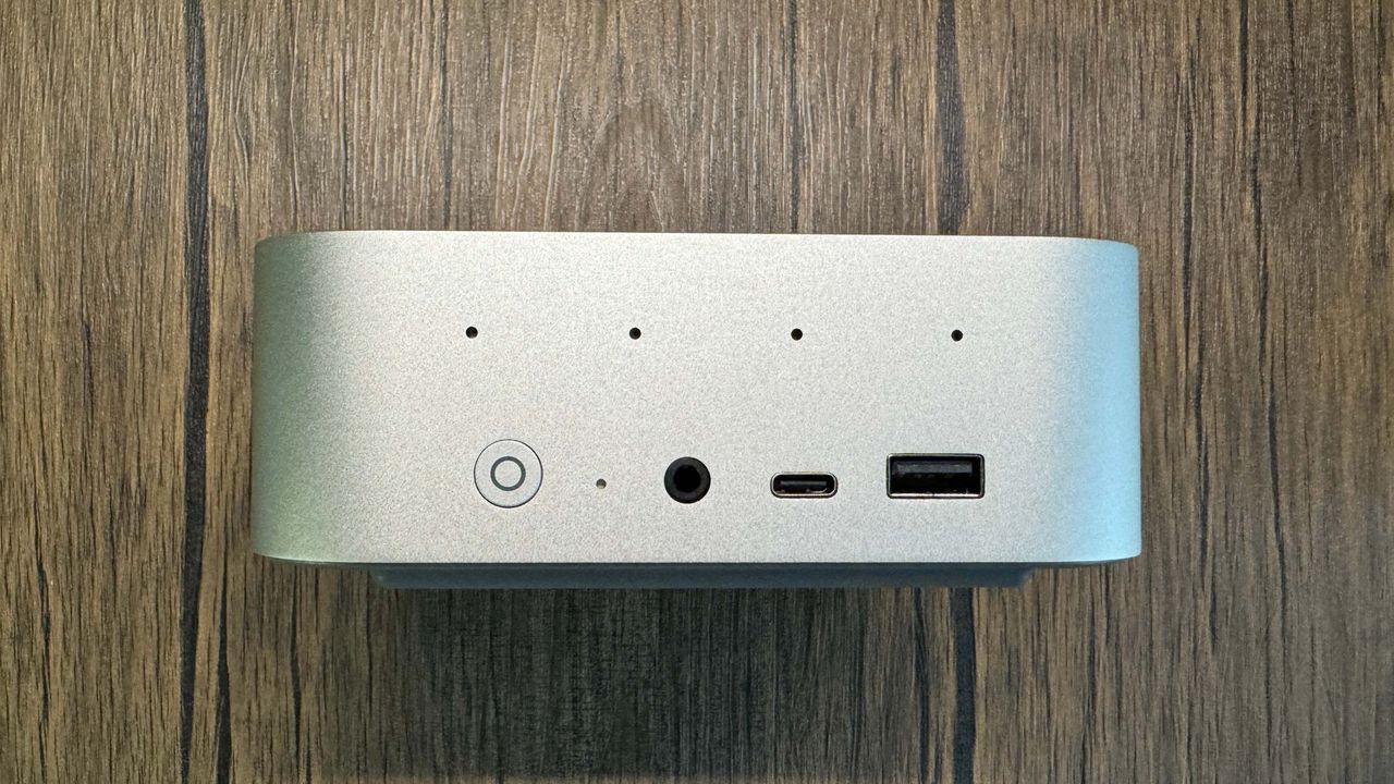 Beelink SER9 Mini PC on a wood background