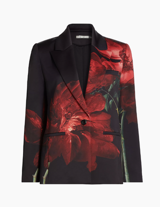 Alice + Olivia floral blazer in front of a plain backdrop