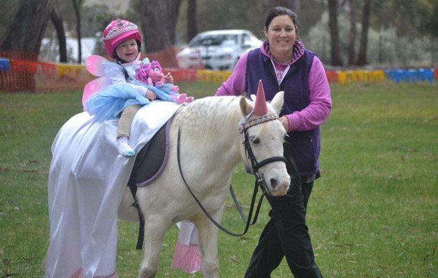 18 months old she is now nearly 5 and is still riding. Though now has a different pony !