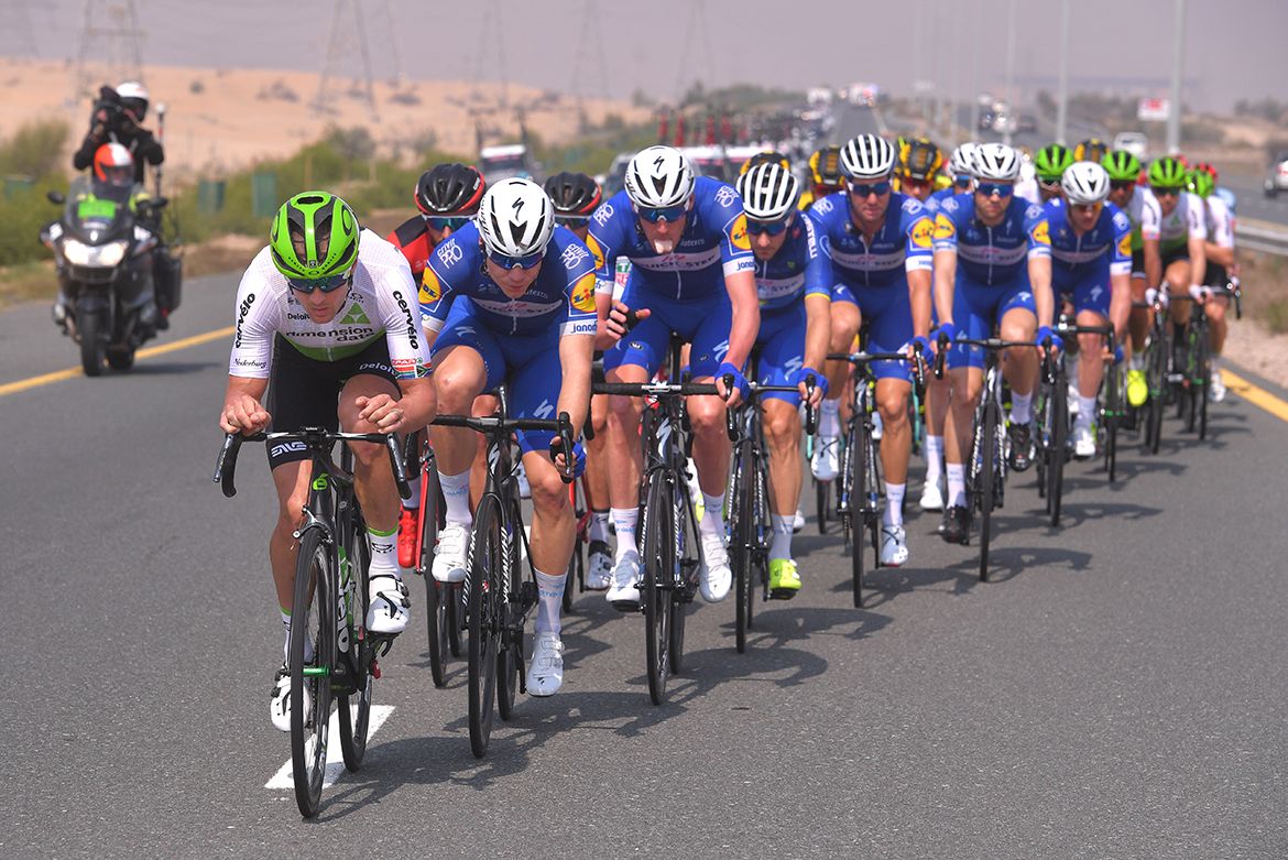 Dimension Data and Quick-Step Floors on the front of the peloton