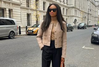 fashion influencer @symphonyofsilk wearing the cropped jacket trend