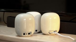 Nest Wifi Pro three nodes facing away showing ports