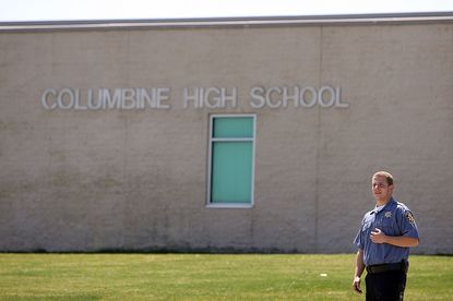A security guard outside Columbine High School.