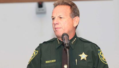 Broward County sheriff Scott Israel confirms armed guard failed to act at school shooting