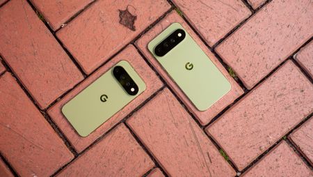 The back of the olive green Google Pixel 11 Pro and Pixel 11 Pro XL next to each other