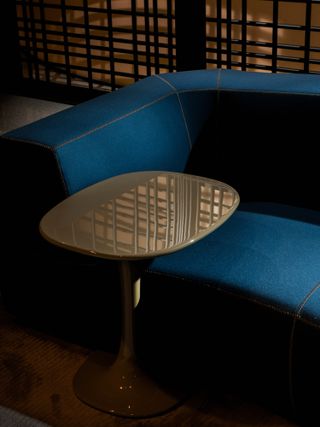 ‘Awa’ side table by Naoto Fukasawa and ‘Bend’ sofa by Patricia Urquiola, both for B&B Italia