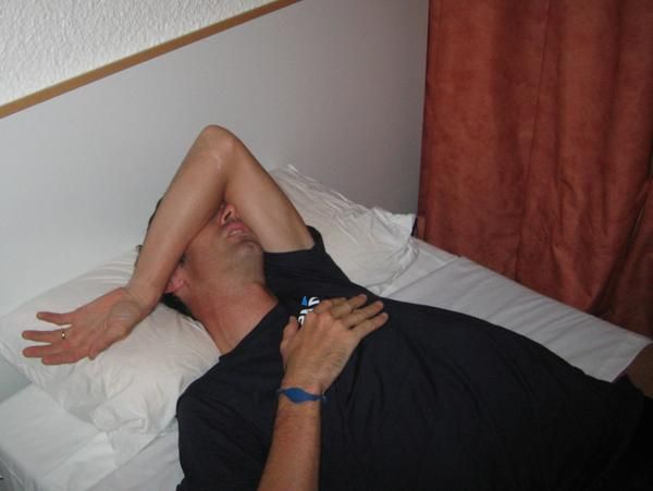 Too tired to talk: Millar mumbles his injuries to the doctor