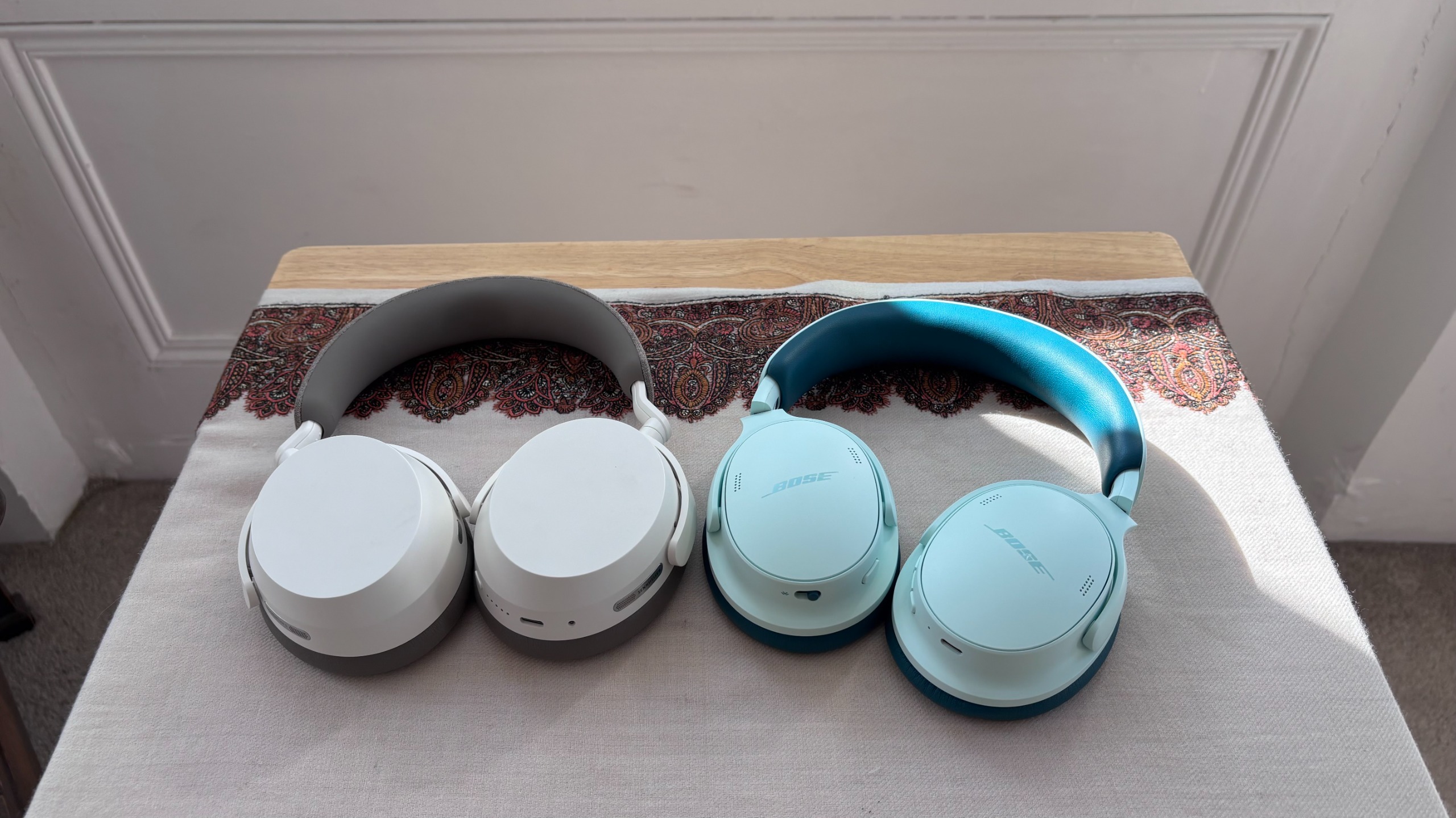 Bose QuietComfort Headphones (2nd Gen) Vs Sennheiser Momentum 5 Wireless with earcups facing down