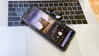 Jabra Connect 5T music app control on phone showing Rudimental album cover