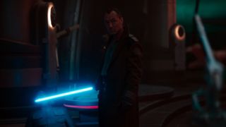 Jude Law's Jod wielding a blue lightsaber in Star Wars: Skeleton Crew episode 8