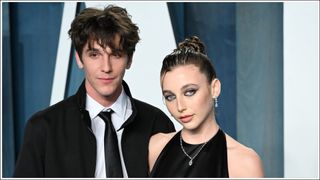 Tucker Pillsbury and Emma Chamberlain attend the 2022 Vanity Fair Oscar Party Hosted by Radhika Jones at Wallis Annenberg Center for the Performing Arts on March 27, 2022 in Beverly Hills, California
